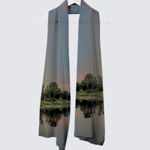 High Fashion Scarf using specialized printing to capture the mirror of the sun setting into a calm hazy lake